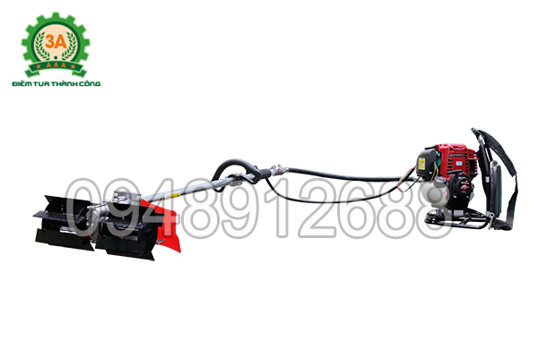 Hình ảnh máy làm vườn nhiều tác dụng 3A khi lắp đầu máy xới cỏ