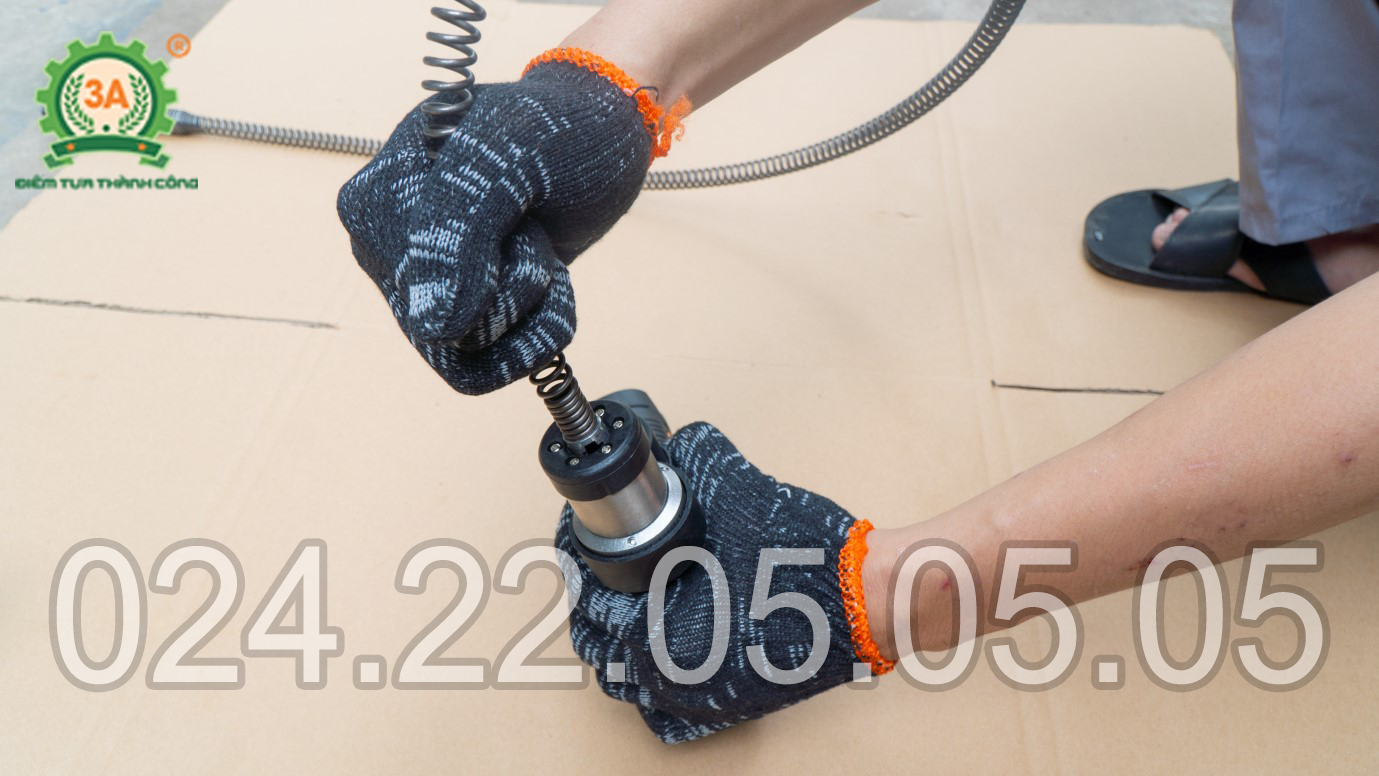 Lắp lò cuộn lò xo vào máy